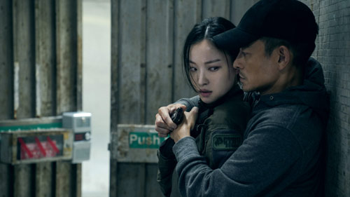 Andy Lau und Ni Ni in "City under Fire"